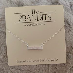 Silver bar necklace with iridescent stone